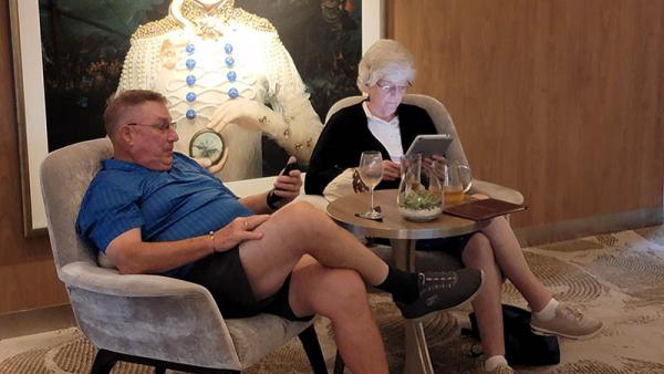 Two Guests Enjoying Cafe al Bacio, the Coffee Shop on Celebrity Edge