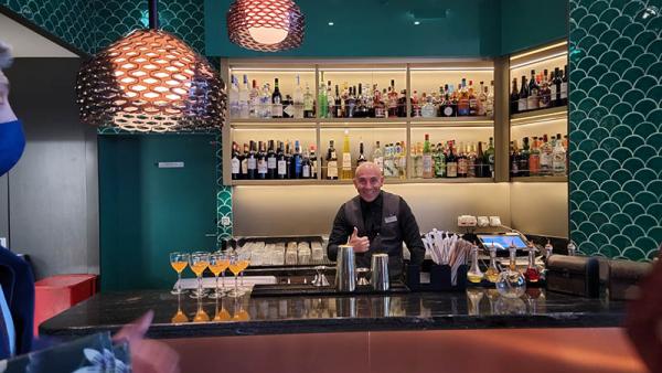 Crew Member Happy to Be Back in Eden Restaurant on Celebrity Edge (Masked Removed for Photo)